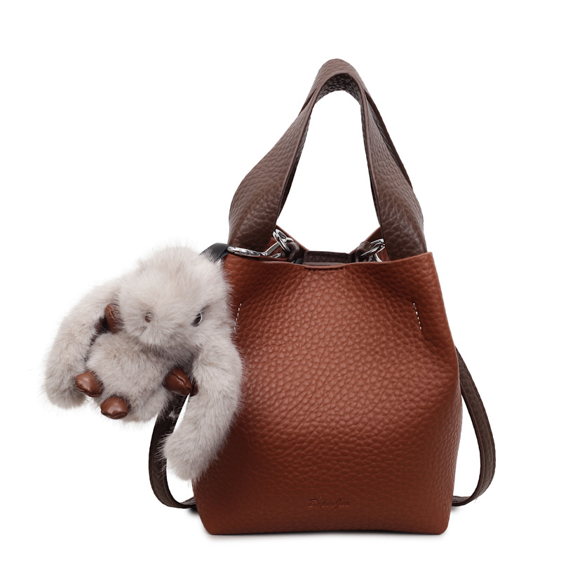 Bolso coreano con estampado de litchi para mujeres 2025 nuevo bolso de cubo de alta calidad de moda versátil bolso de hombro