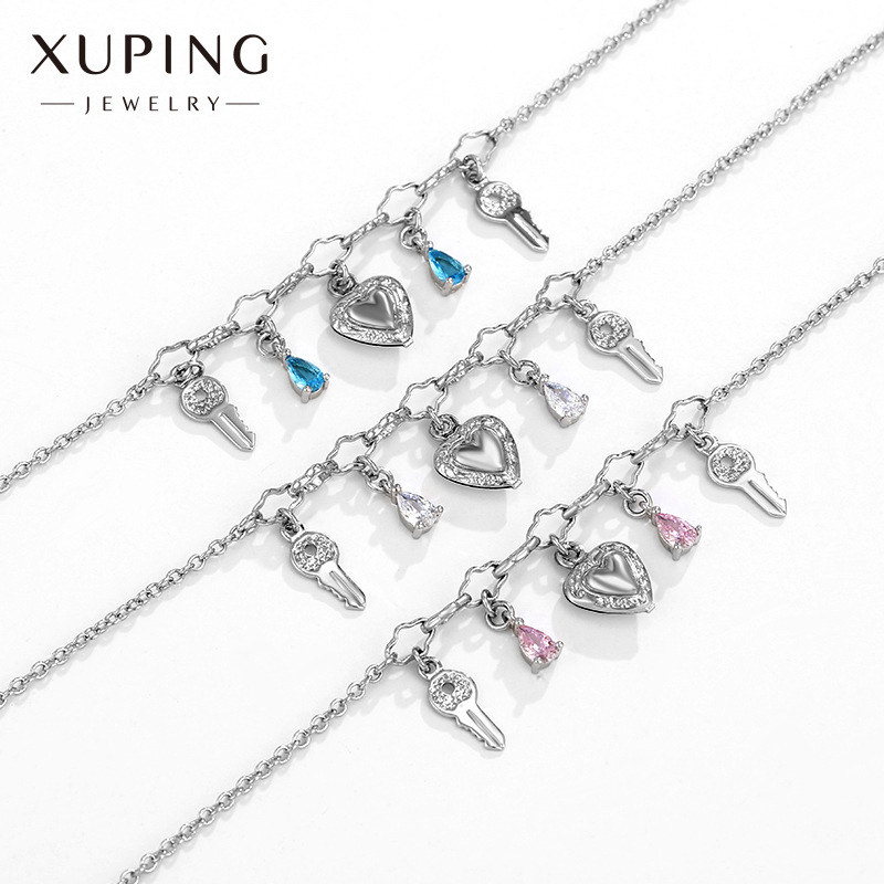 Pulseras de tobillo Xuping al por mayor, joyería europea y americana de aleación chapada en oro con diseño de corazón, hoja y llave, con circonita, moderna y versátil.