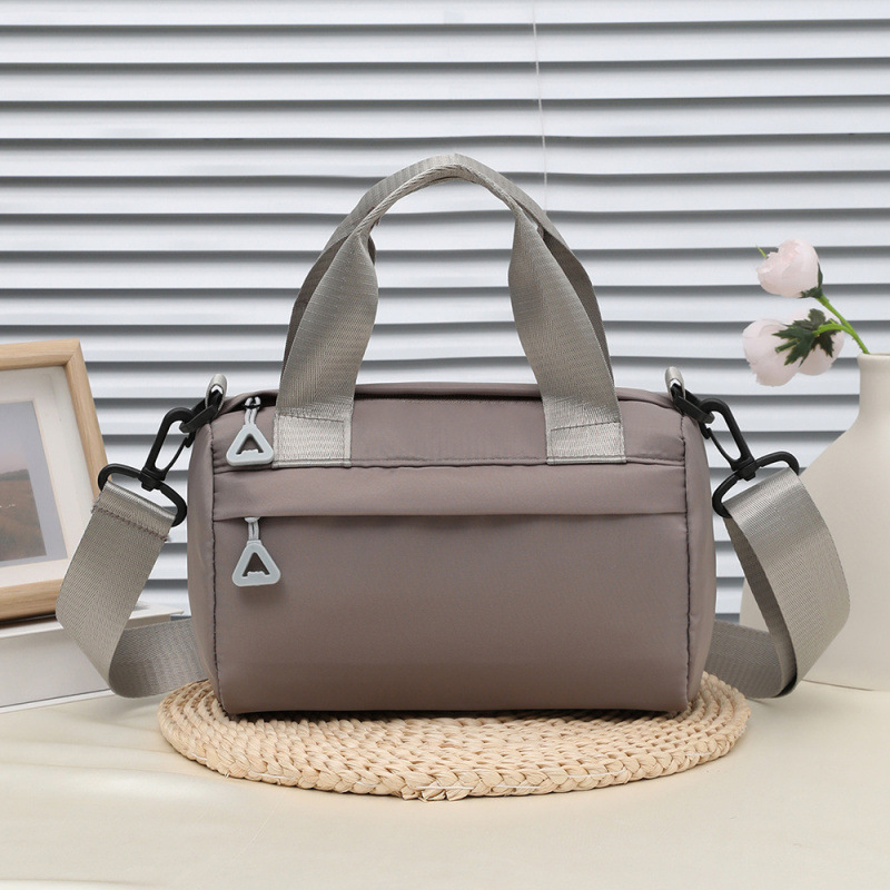 Bolso de mujer japonés simple bolso de hombro de mujer casual de gran capacidad bolso de mano deportivo versátil bolso de viento deportivo