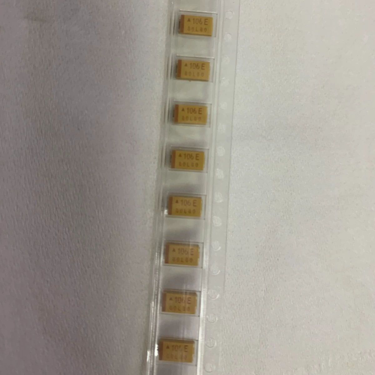 Китайский SMD танталовый конденсатор 106V 10μF 35V типа C корпус 6032 10% конденсатор с полярностью