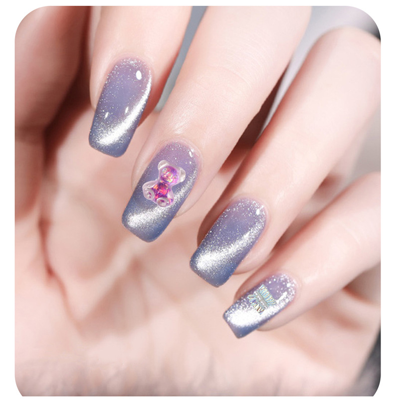 24 rejilla de uñas decoraciones mixtas remache de Cristal Oso arco tienda conjunto completo de joyería de uñas DIY