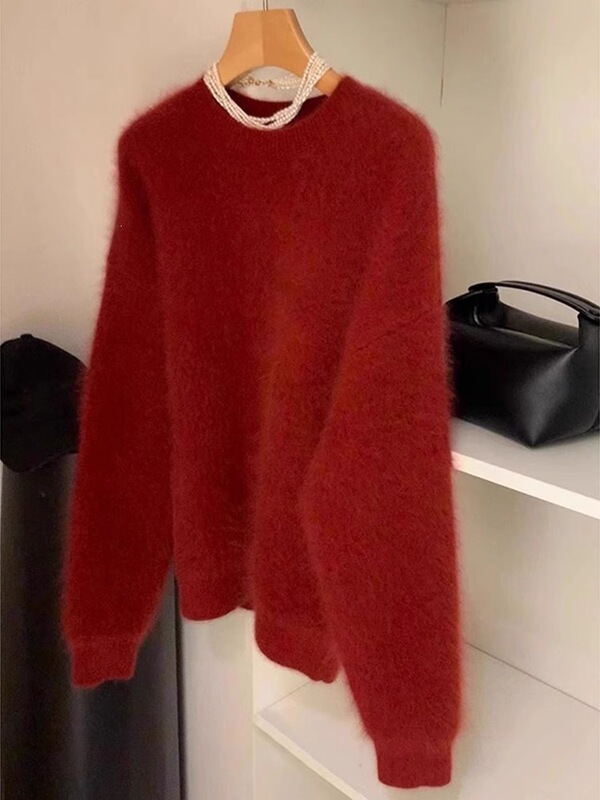 A bright, Christmas-themed red mink fur sweater for women, perfect for autumn and winter, with a sophisticated and stylish look. This beautiful, thick knit top is a European-style piece A bright, Christmas-themed red mink fur sweater for women, perfect for autumn and winter, with a sophisticated and stylish look. This beautiful, thick knit top is a European-style piece