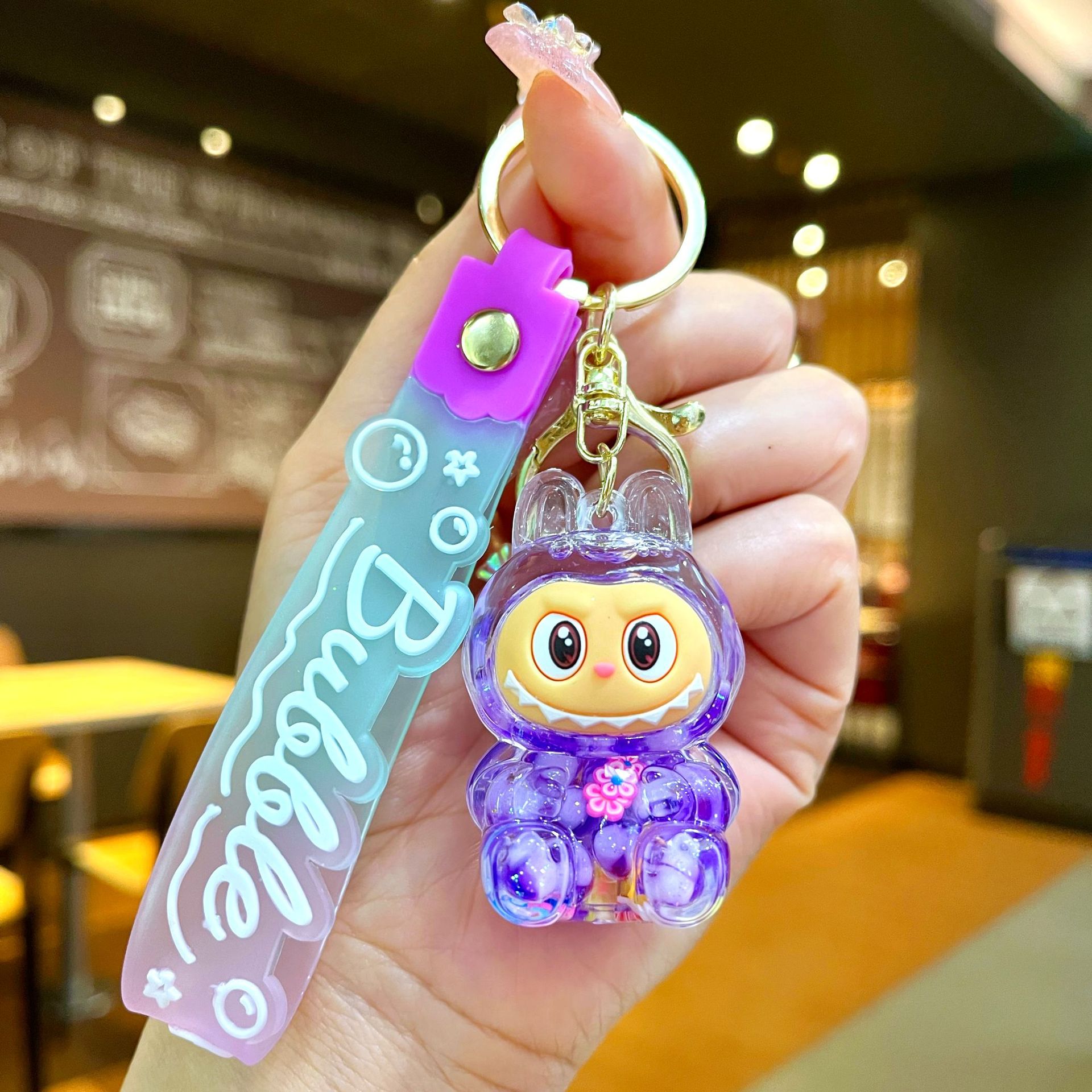 Llavero red acrílico con arena flotante