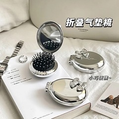 小さな櫛は携帯的に折り畳み櫛を持っています。