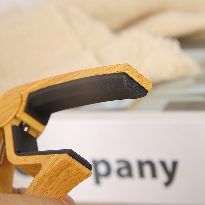 Guitarra de madera folk guitarra eléctrica ukulele universal de aleación de aluminio de madera