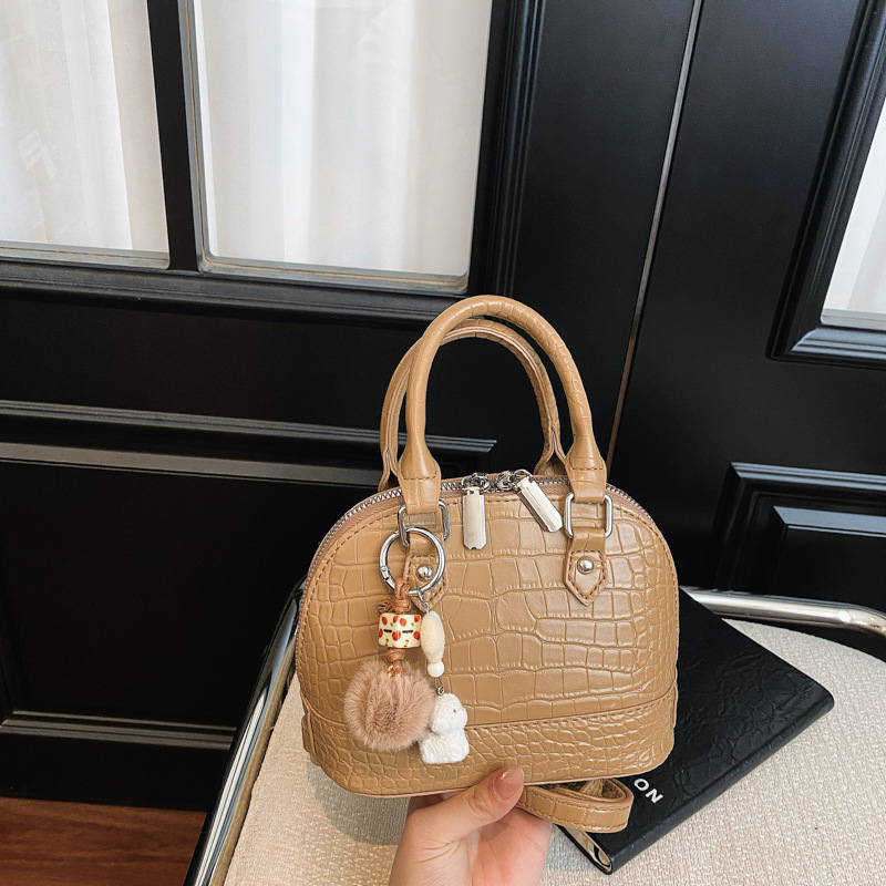 Verano estampado de piedra sensación diaria bolso de mano para mujeres 2026 nueva moda viaje bolsa de hombro bolsa de concha de tramo inclinado