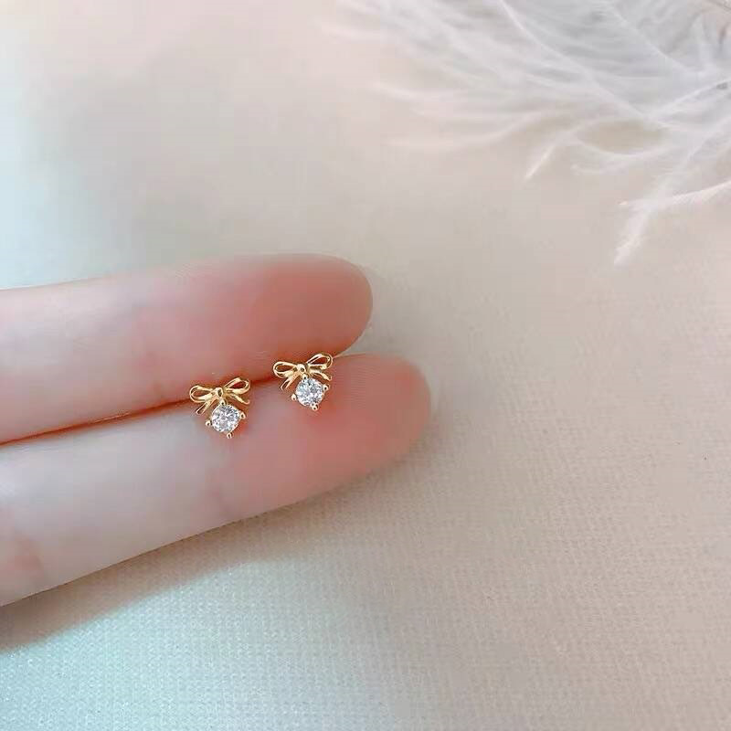 Elegant sophisticated small cute design earrings with bow