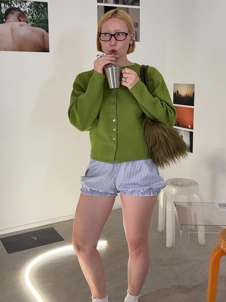 Elegante estilo simple estilo de color sólido cuello redondo de una sola fila cardigan otoño 2025 nuevo estilo transfronterizo europeo y americano