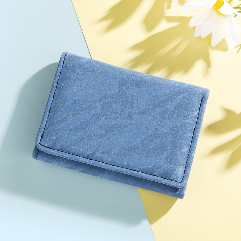 Ventas transfronterizas calientes de 30% billetera de descuento de agua corrugada de moda de estudiantes billetera de cambio de billetera universal bolsa de tarjetas para mujeres