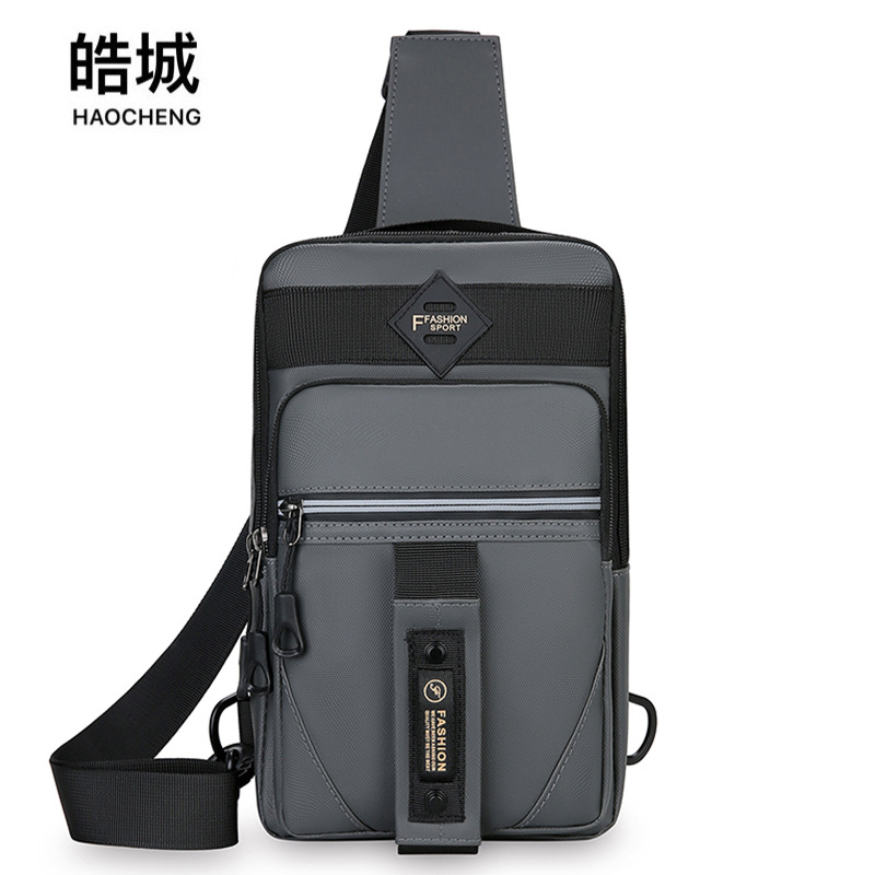 Bolso de moda para hombre Bolso de pecho para hombre reflectante nocturno multifuncional simple de moda casual Bolso de mensajero portátil para deportes al aire libre