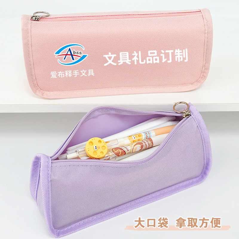 El estuche para lápices se puede imprimir con el logotipo, simple, de gran capacidad, caja de papelería de color Macarons de alto valor, bolsa de almacenamiento de lápices escolares