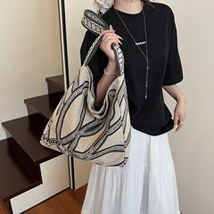 国境を越えたポニートーテムプリントのトートバッグ女性2025新型レトロ大容量キャンバスバッグ