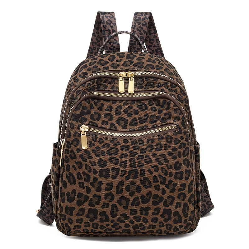 Mochila transfronteriza con estampado de leopardo súper fuego para mujer 2024 nuevo estilo salvaje para mujer mochila casual de gran capacidad bolso de viaje de moda