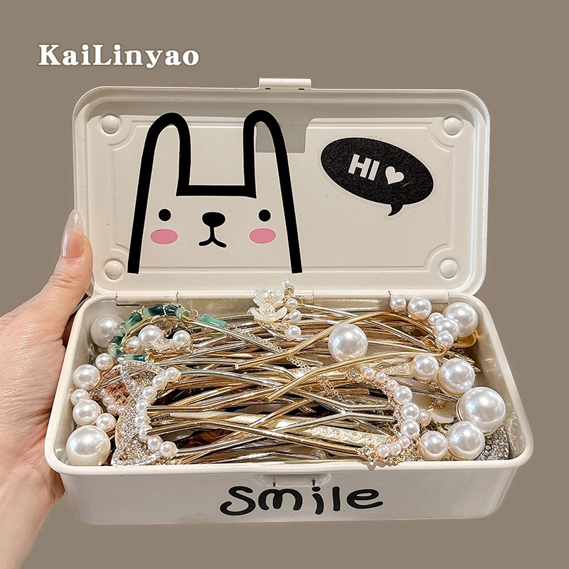 Perla de alta sensación en forma de U abrazadera de cabello bola de cabello fija abrazadera de cabello nuevo peine de cuatro dientes joyas al por mayor