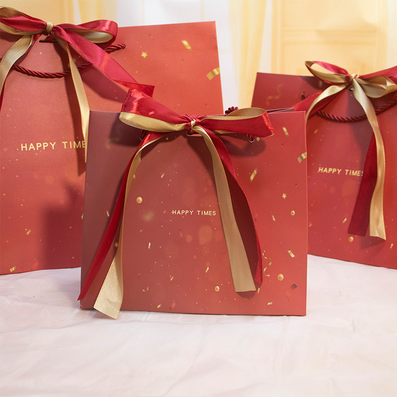 红色喜庆礼物包装袋高级感礼品袋高颜值蝴蝶结手提纸袋大现货批发