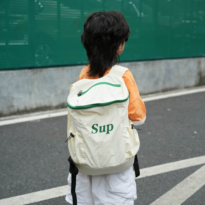 Mochila coreana para niños y niñas, mochila deportiva de viajes de gran capacidad, mochila para niños con letras de aire extranjero 2025, mochila para niños
