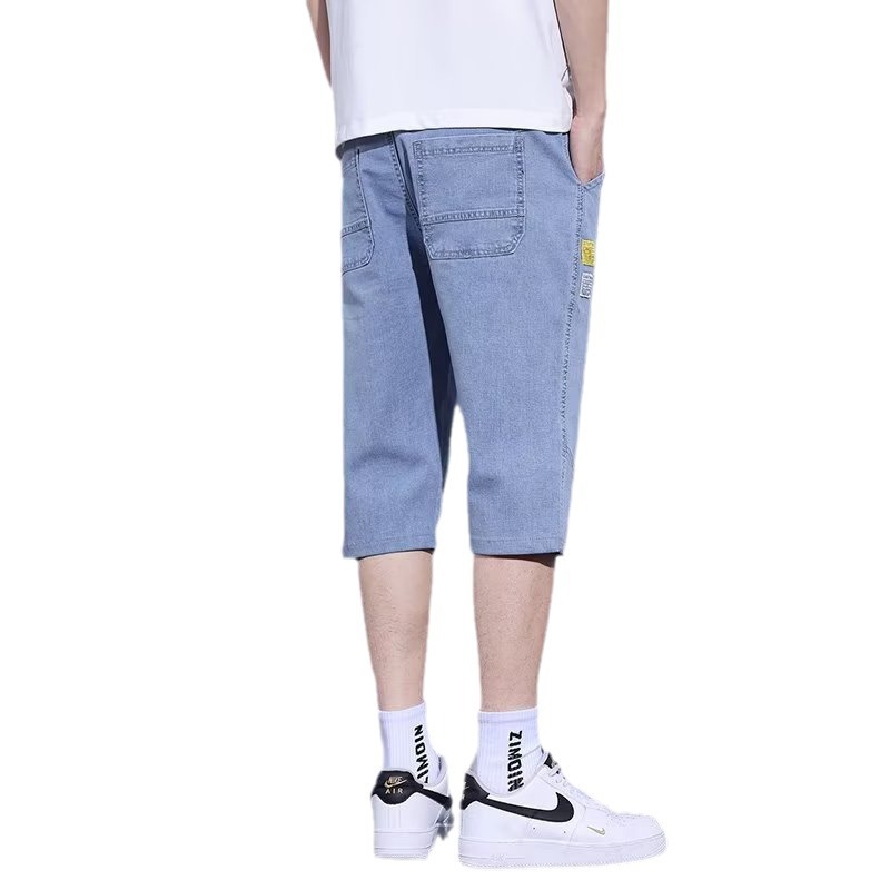 Moda de mezclilla de verano tendencia de los hombres sueltos rectos tallas grandes pantalones recortados marca de moda de los hombres pantalones medios de 7 puntos estilo fino de verano