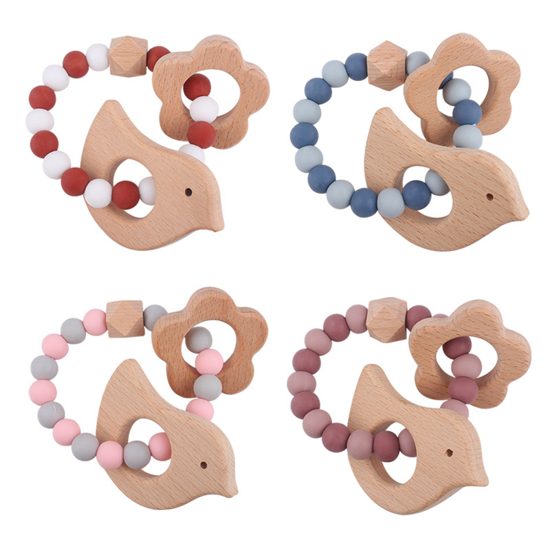 Nuevo bebé dibujos animados pájaros pulsera de madera de haya juguetes creativos pulsera de dientes de silicona pulsera de dientes