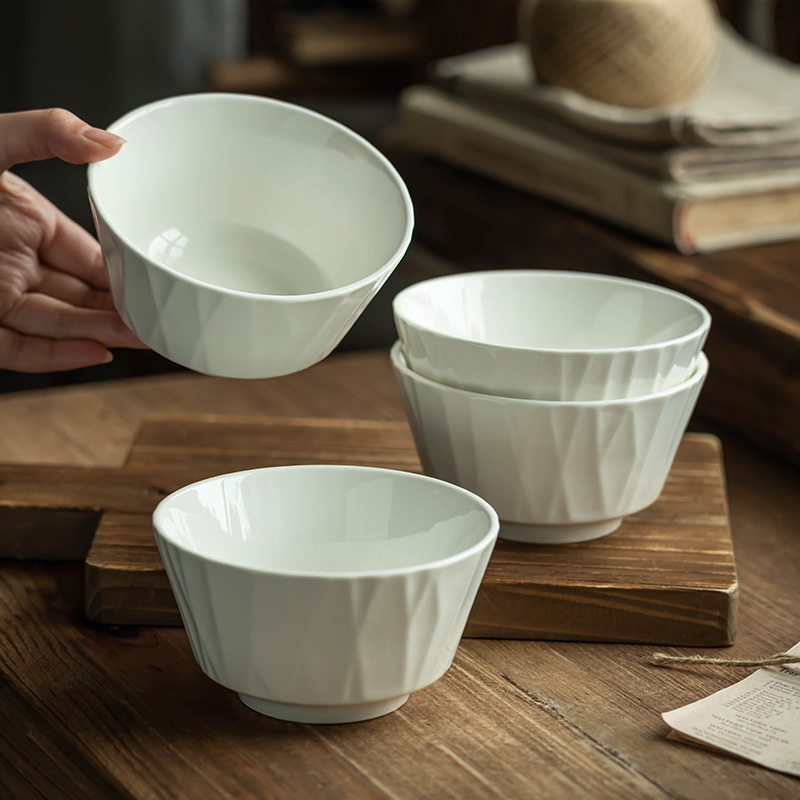 Cuencos de arroz retro en relieve de 4.5 pulgadas pequeños cuencos de cerámica en relieve casero cuencos de arroz de color sólido cuencos de cubiertos al por mayor