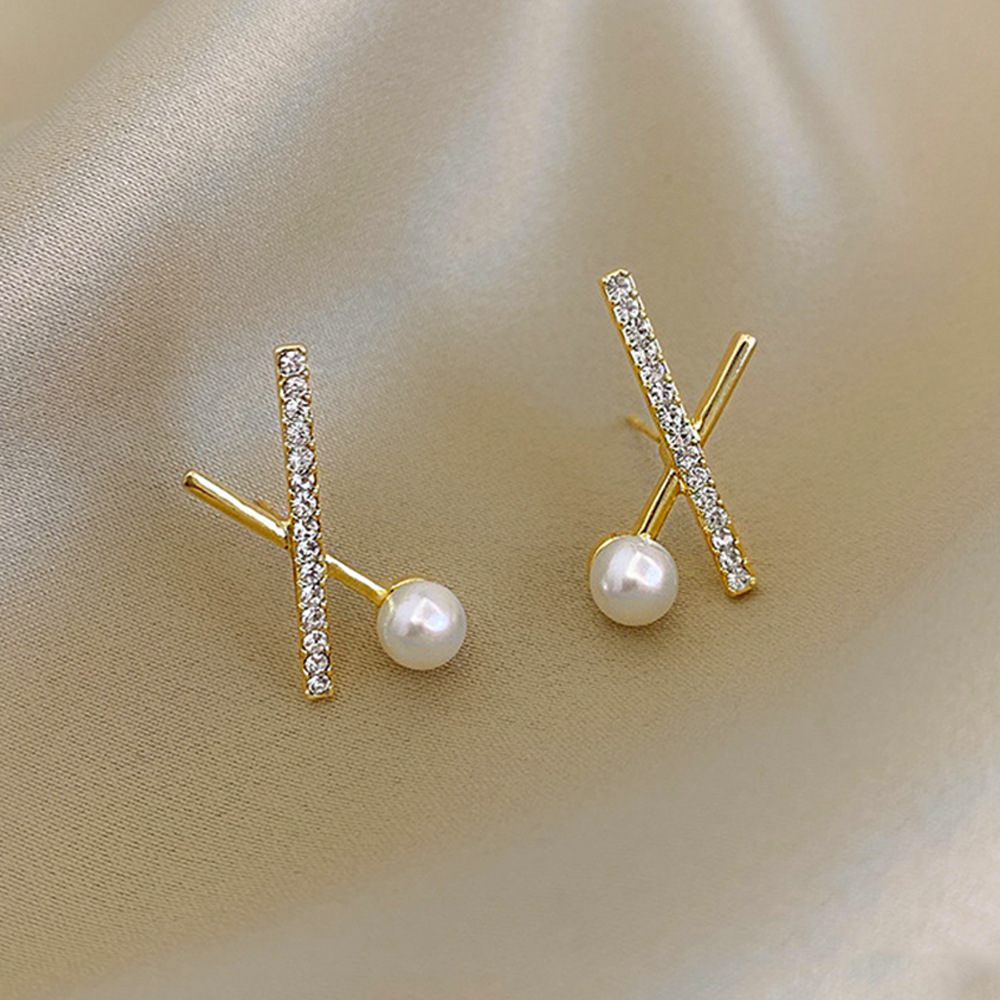 Aguja de plata de moda alta sensación de diamante de goteo de aceite pendientes nicho universal elegante pernos de orejas ligero lujoso temperamento simple orejas para mujeres