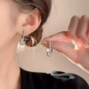 Shovel, earrings, silver 1855 sample