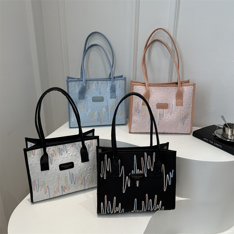 Diseño de moda de hombro 2024, nuevo temperamento de color retro bolsas de brazo de gran capacidad de mamá bolsas de mano