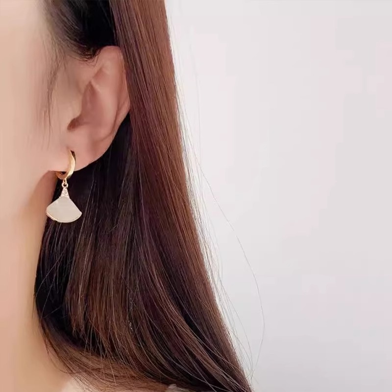 Golden design earrings