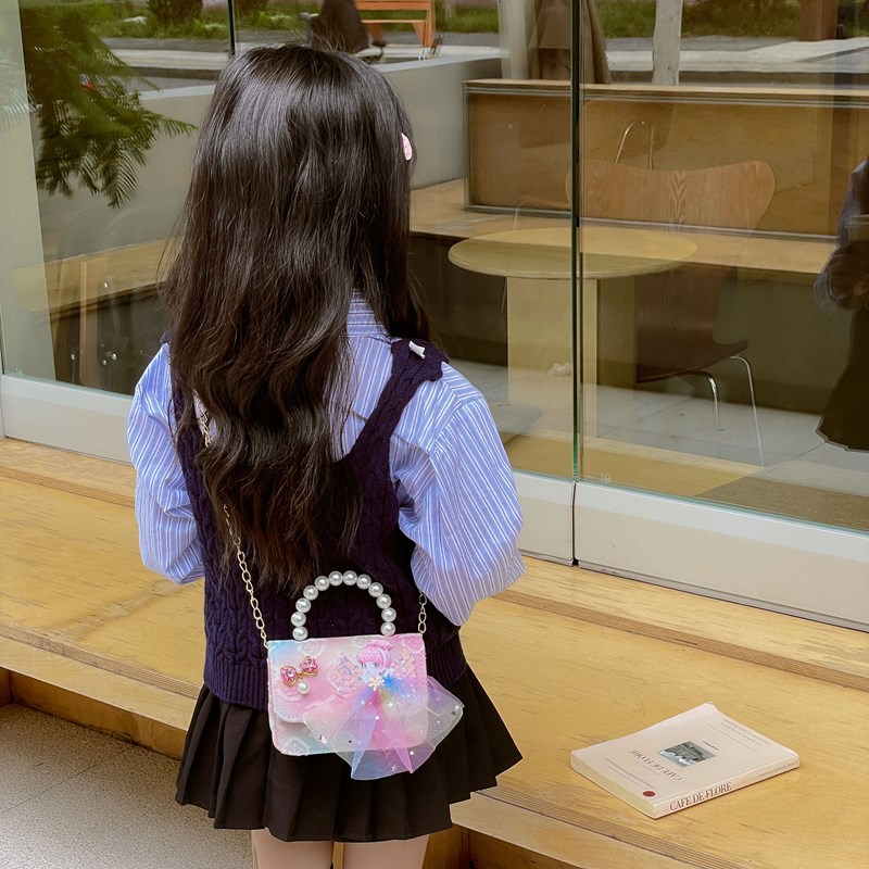 Nuevo bolso infantil dulce lindo arco bebé bolso de perla cadena de moda bolso de hombro para hombres y mujeres