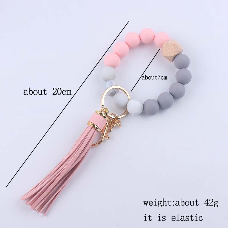 Nuevo cuero creativo pu borla colgante silicona muñeca llavero colgante silicona cuentas pulsera llavero
