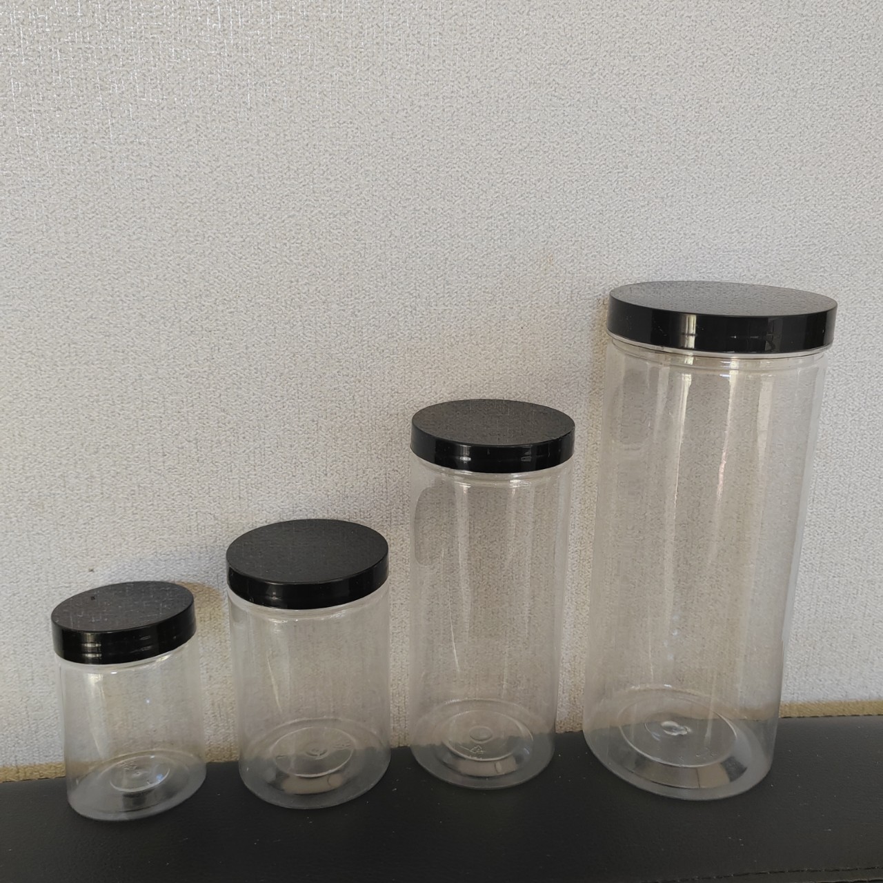 批发各种口径黑盖透明塑料密封罐广口密封罐笔筒毛巾宠物粮储物罐