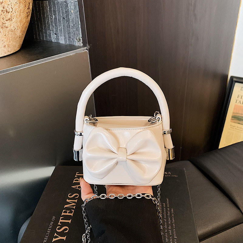 Mini lindos bolsos de mano para niños 2026 nuevo arco de moda infantil interesante lindos bolsos de hombro
