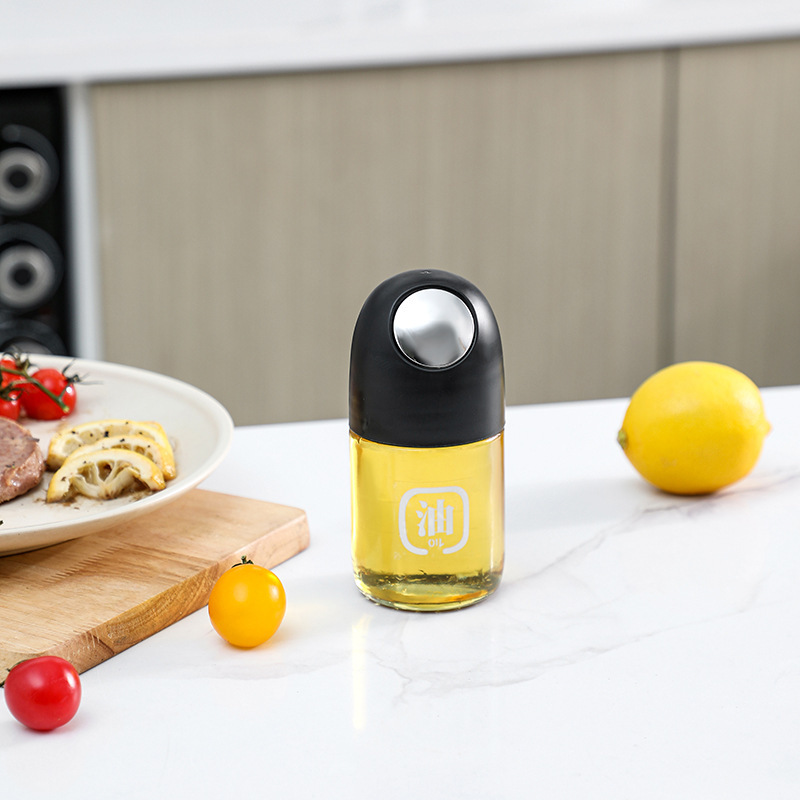 La nueva olla de aceite de vidrio de apertura y cierre automático, botella de condimento de cocina para el hogar, mayor capacidad, boquilla de aceite en forma de gota, tanque de vinagre de salsa de soja