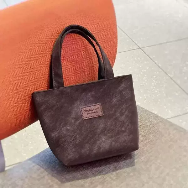 Simple and elegant small PU handbag, large capacity, portable, suitable for carrying a phone, compact and versatile, wrist bag, waterproof