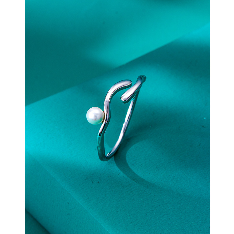 S925 anillo de perlas de plata esterlina personalidad abierta femenina diseño de nicho de moda Otoño e Invierno luz anillo de lujo personalidad estilo de moda