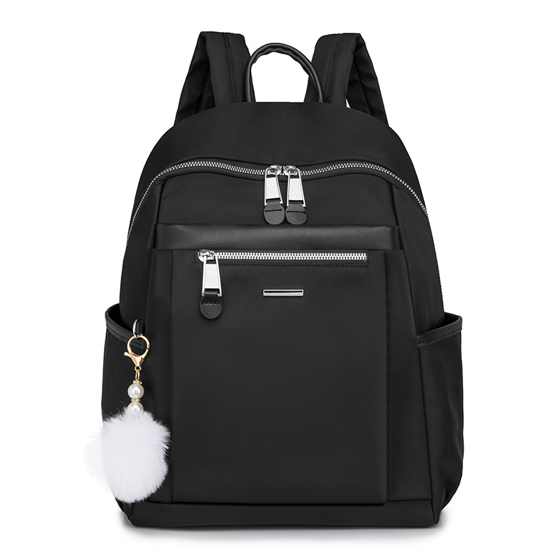 Mochila de nailon para mujer 2024 nueva moda salvaje para mujer mochila para desplazamientos urbanos mochila de gran capacidad al por mayor