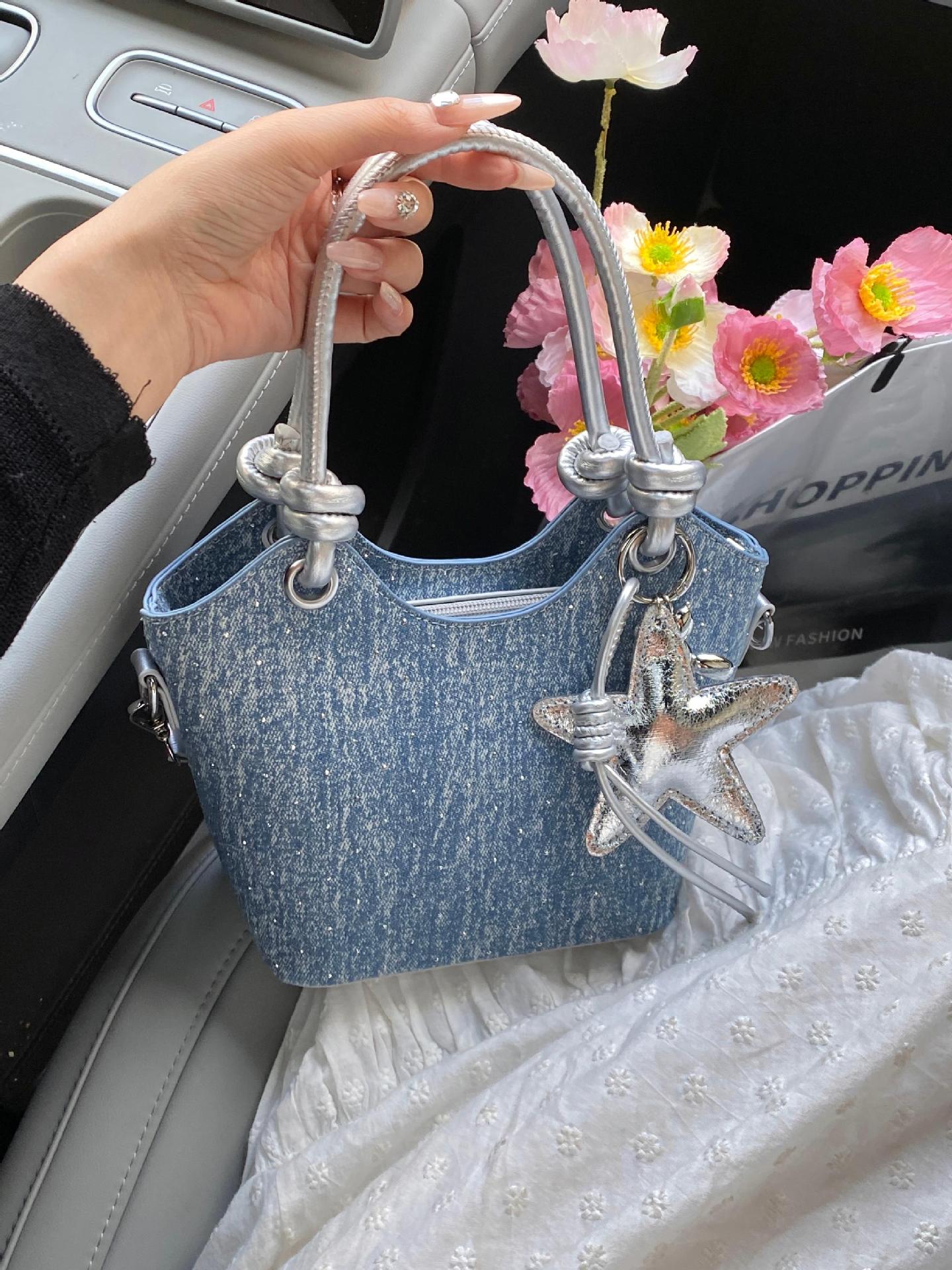 Bolsa de mano de moda coreana de estilo extranjero, bolso de mano de mujer, verano 2025, nuevo estilo universal, bolso de cubo de moda, bolso de hombro de viaje