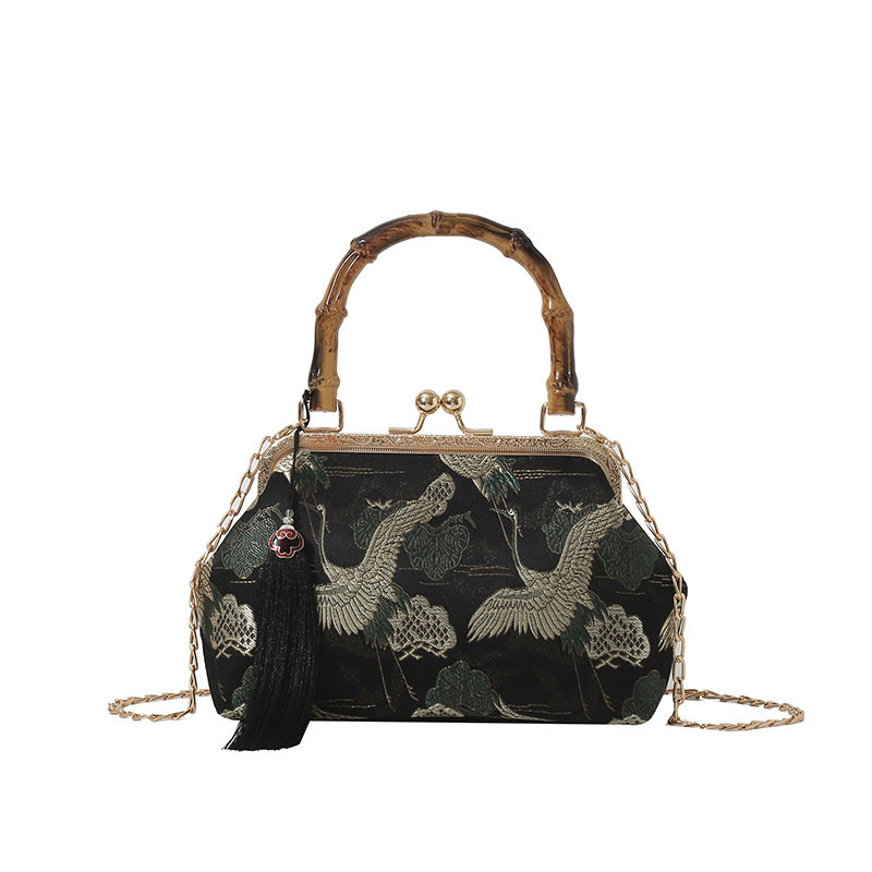 Elegante borsa a secchiello da donna con manico in legno e catena_voghion.com