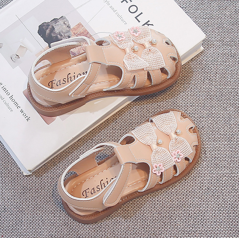 Sandallas de niñas verano 2026 nuevo estilo de moda infantil zapatos casuales versátiles arco sandalias de cabeza de bolsa zapatos princesa image 8