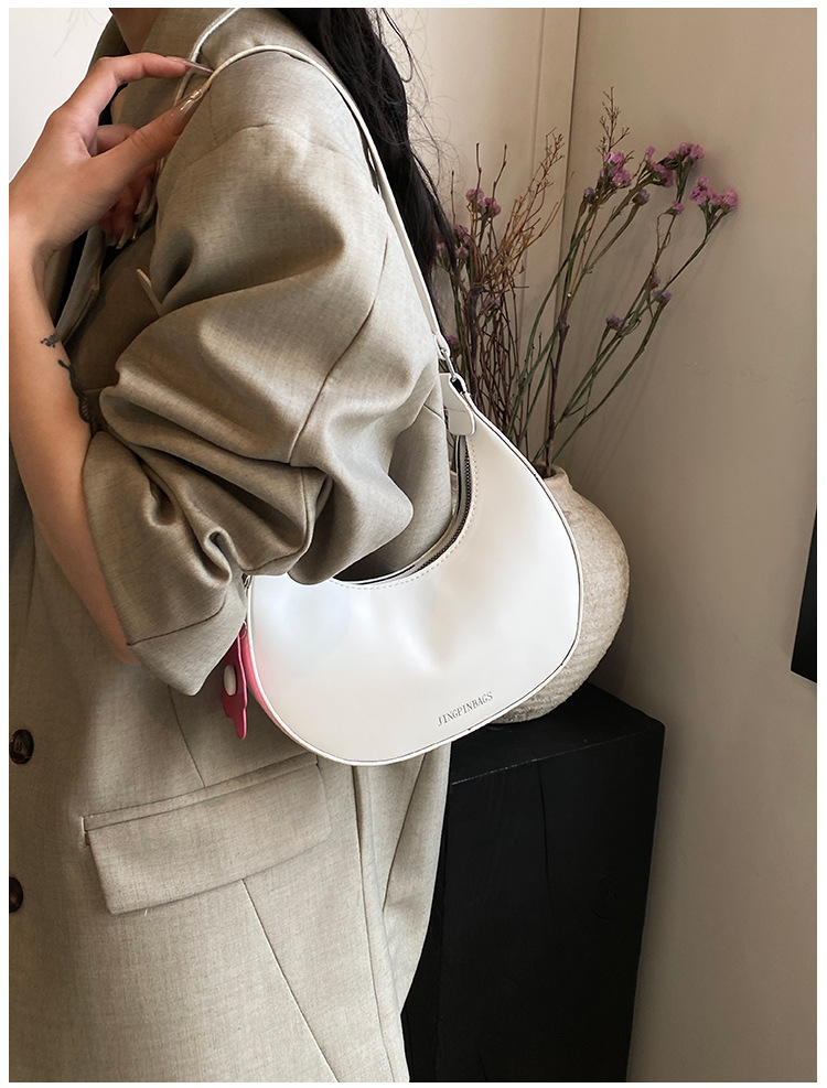 Cross-border women's bag 2024 New style, trendy texture, versatile, ins fashion single-shoulder armpit bag, small flower pendant, crescent moon bag undefined