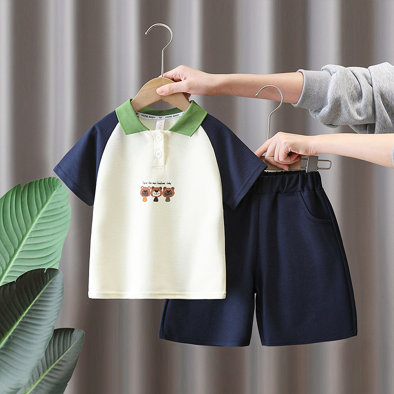 7166 Traje de verano para niños 2025 Nuevo estilo estilo estilo extranjero Polo de manga corta Ropa de verano para bebés Traje de dos piezas de verano