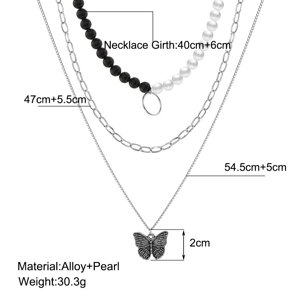 Cross-border creative simple color matching multilayer black and white pearl butterfly pendant neckl