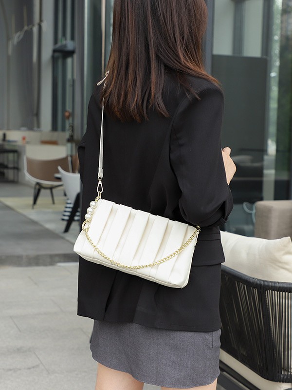 Bolso de moda coreano plegado para mujeres 2026 verano nuevo nicho de lujo pequeño bolso cuadrado de alta calidad de viaje de hombro mochila