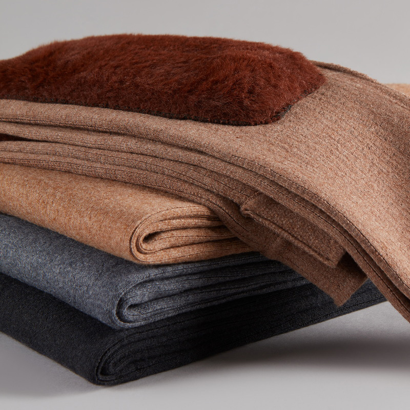 Unisex wool pants, solid color knitted wool pants, fleece-lined, thickened, high-waisted, slim fit, warm, and breathable.
