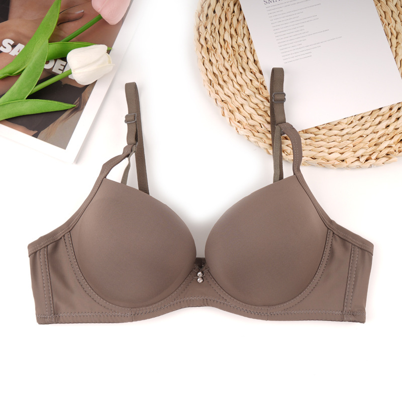 Fábrica de stock de ropa interior lisa sin marcas de pecho pequeño damas juntas sujetador de ajuste de soporte de la niñez sujetador del sudeste asiático