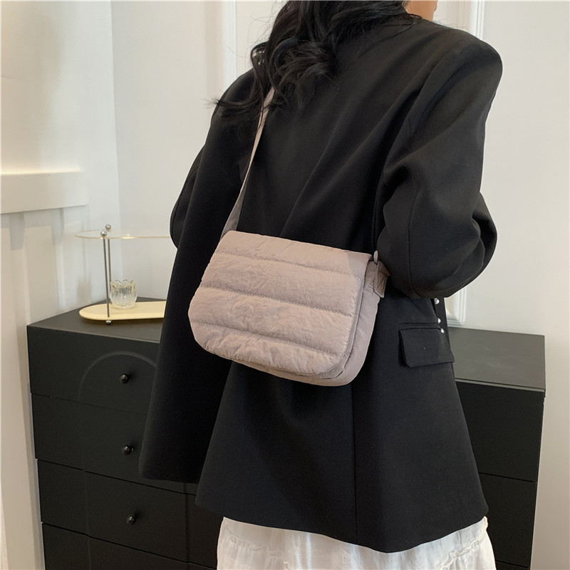 Daily casual simple small square bag Korean spring lightweight personality design popular shoulder crossbody horizontal small square bag_voghion.com