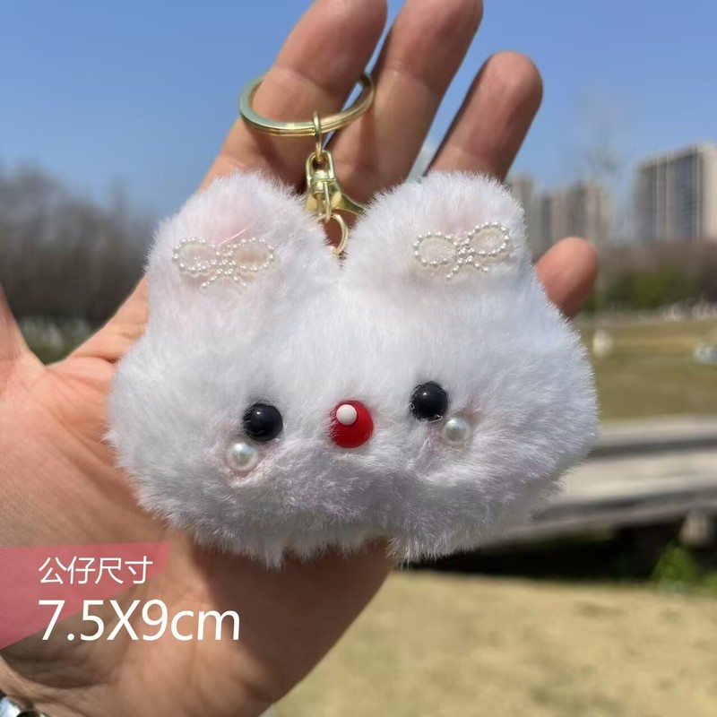 かわいい赤い本の熱い金の蝶結びのウサギはギシギシと言います。|undefined