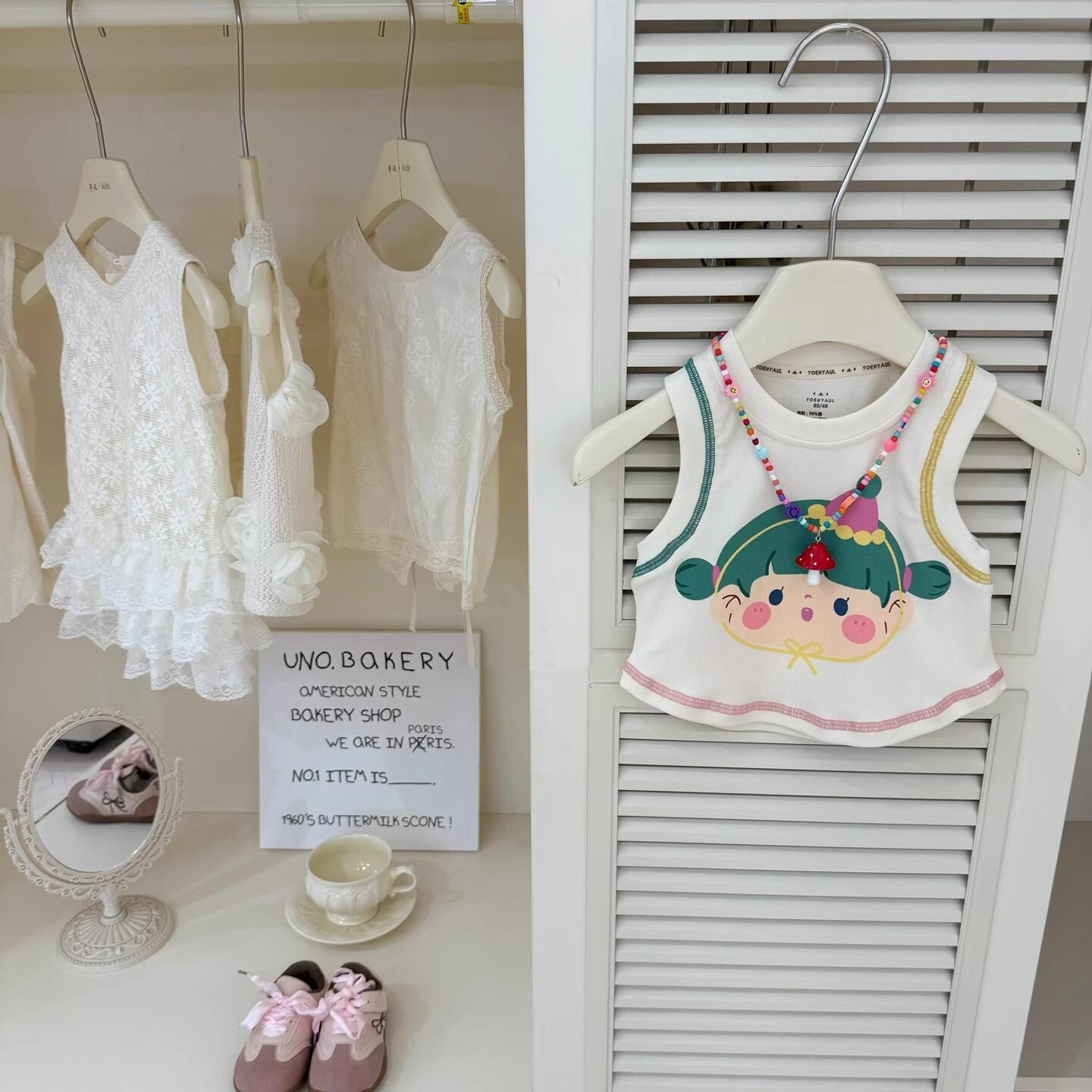 Xianning siete ropa para niños verano niñas chaleco de algodón 2025 nuevo verano niños dulce y fresco dibujos animados camiseta sin mangas marea