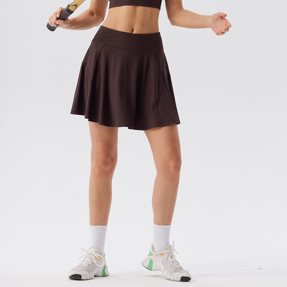 Deportes al aire libre correr falda deportiva corta una mujer falda de dos piezas falda de mitad de cuerpo anti-fuerte forrado falda de tenis de cintura alta