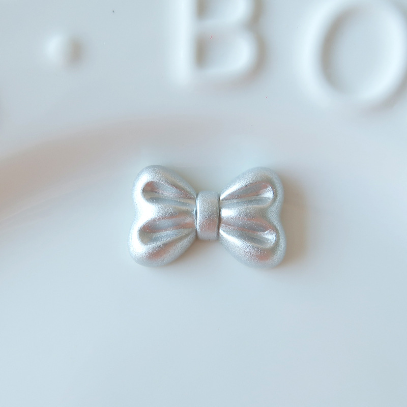 人気メッキ愛蝶ネクタイアクセサリー高級感シルバーグレー笑顔ヘアアクセサリー材料卸売り