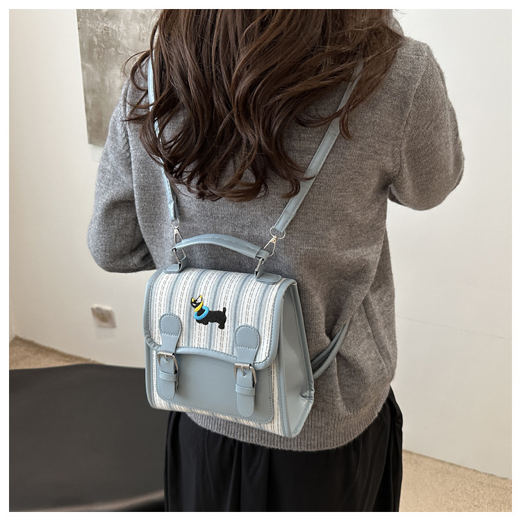 The new backpack for the autumn of 2024 is a fashionable and simple hand-held student single-shoulder bag with a checkered lid and a retro crossbody style undefined